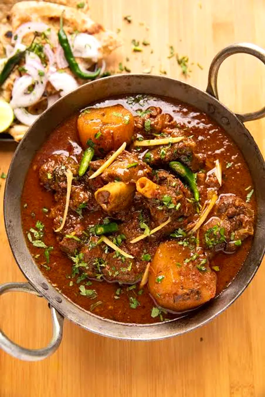 Slow-cooked mutton curry with potato