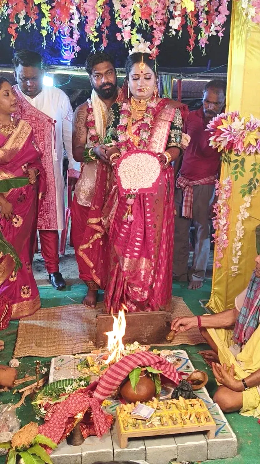 Bengali bride and groom at the sacred fire ritual