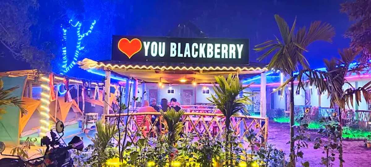 YOU BLACKBERRY dining deck glowing at night