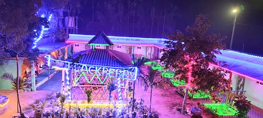 Resort campus glowing with lights at night from above