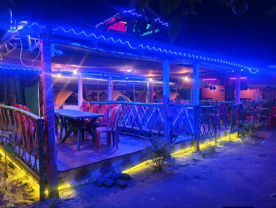 Dining deck glowing blue at night
