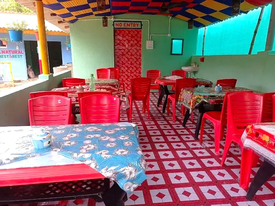 Family dining hall with red chairs