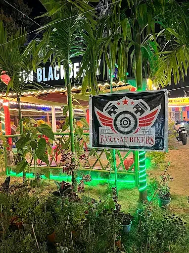 Resort entrance glowing at night