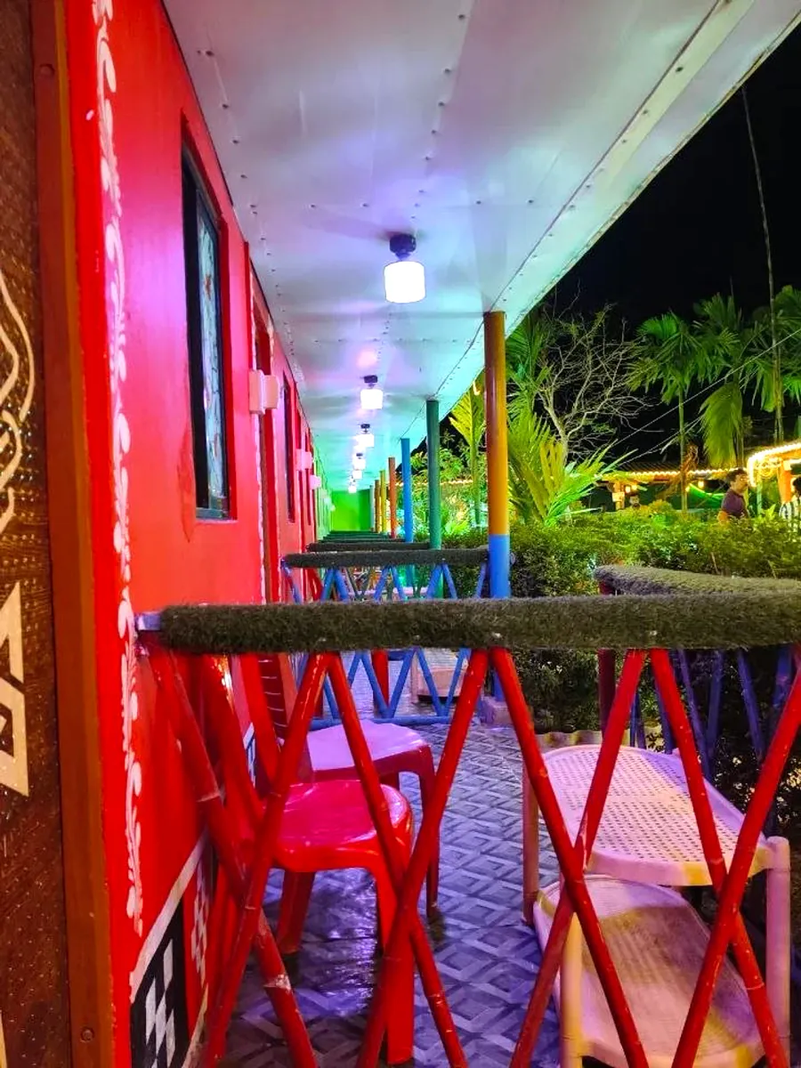 Cottage veranda with chairs at night